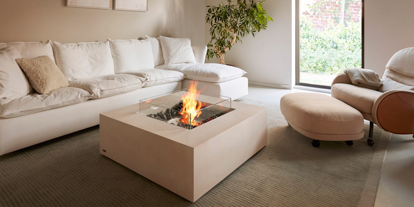 Concrete square fire pit on a timber deck