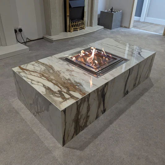 Square indoor fire table in a bright living room